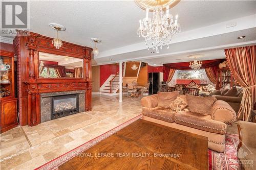 1100 Moffatt Drive, Ottawa, ON - Indoor Photo Showing Living Room With Fireplace