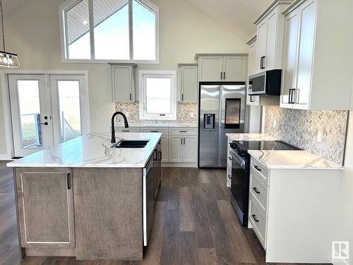 52103 Rge Road 280, Rural Parkland County, AB - Indoor Photo Showing Kitchen With Double Sink With Upgraded Kitchen