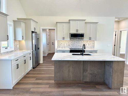 52103 Rge Road 280, Rural Parkland County, AB - Indoor Photo Showing Kitchen With Upgraded Kitchen