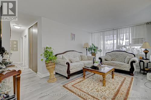 1511 - 100 Wingarden Court, Toronto, ON - Indoor Photo Showing Living Room