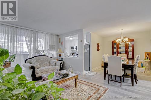 1511 - 100 Wingarden Court, Toronto, ON - Indoor Photo Showing Living Room