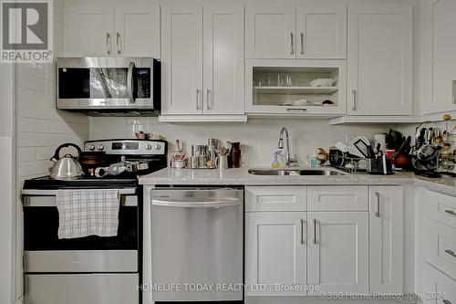 1511 - 100 Wingarden Court, Toronto, ON - Indoor Photo Showing Kitchen With Double Sink With Upgraded Kitchen