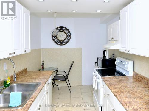 2003 - 3100 Kirwin Avenue E, Mississauga, ON - Indoor Photo Showing Kitchen With Double Sink