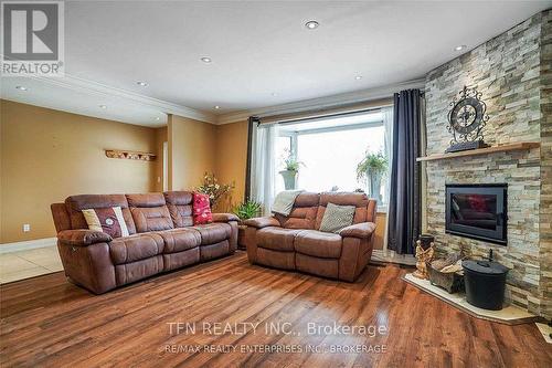 Upper - 1810 South Sheridan Way, Mississauga, ON - Indoor Photo Showing Living Room With Fireplace