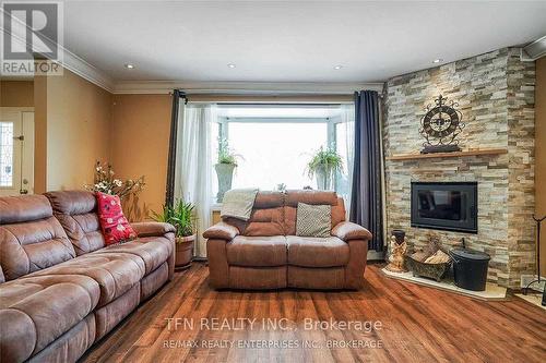 Upper - 1810 South Sheridan Way, Mississauga, ON - Indoor Photo Showing Living Room With Fireplace