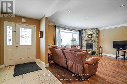 Upper - 1810 South Sheridan Way, Mississauga, ON - Indoor Photo Showing Living Room With Fireplace