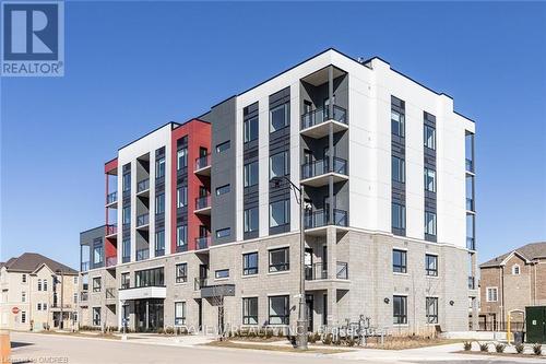 109 - 3265 Carding Mill Trail, Oakville, ON - Outdoor With Balcony With Facade