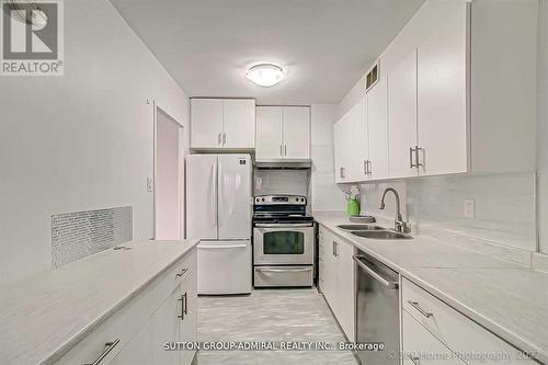 902 - 25 Four Winds Drive, Toronto, ON - Indoor Photo Showing Kitchen With Double Sink