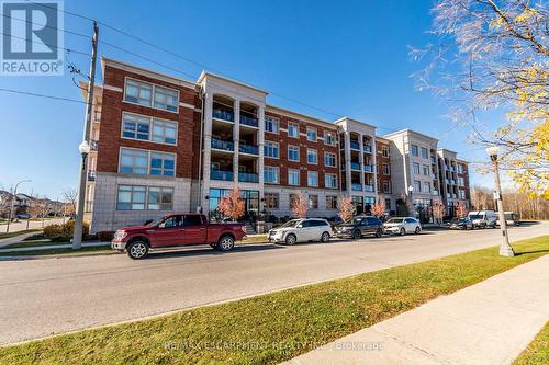 305 - 195 Commonwealth Street, Kitchener, ON - Outdoor With Facade