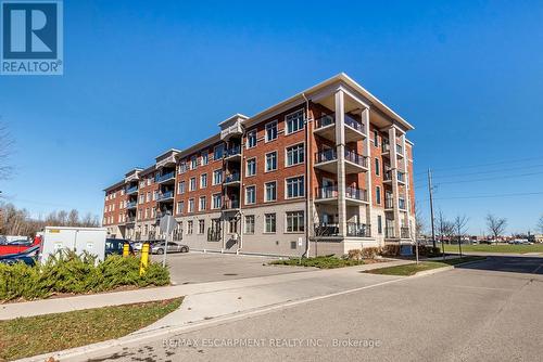 305 - 195 Commonwealth Street, Kitchener, ON - Outdoor With Balcony With Facade