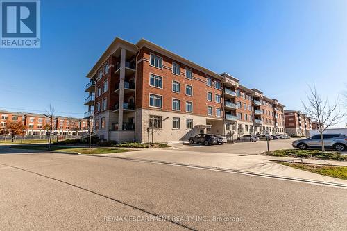 305 - 195 Commonwealth Street, Kitchener, ON - Outdoor With Balcony With Facade