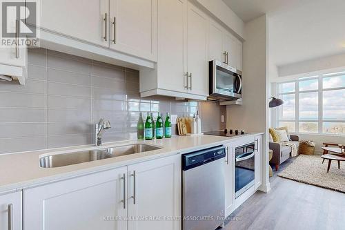 418 - 600 North Service Road, Hamilton, ON - Indoor Photo Showing Kitchen With Double Sink