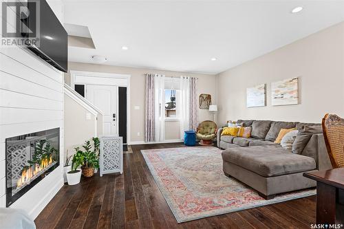 19 Wellington Place, Moose Jaw, SK - Indoor Photo Showing Living Room With Fireplace