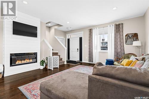 19 Wellington Place, Moose Jaw, SK - Indoor Photo Showing Living Room With Fireplace