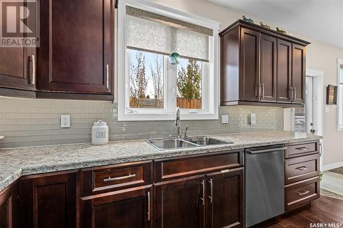 19 Wellington Place, Moose Jaw, SK - Indoor Photo Showing Kitchen With Double Sink