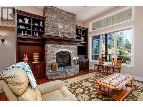 2019 Twin Ridge Court, Kelowna, BC - Indoor Photo Showing Living Room With Fireplace