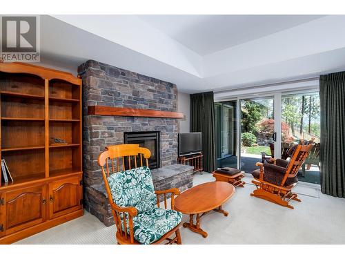 2019 Twin Ridge Court, Kelowna, BC - Indoor Photo Showing Living Room With Fireplace