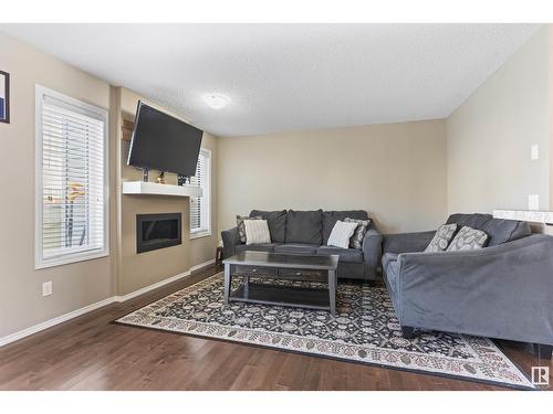 3104 16 Av Nw, Edmonton, AB - Indoor Photo Showing Living Room With Fireplace