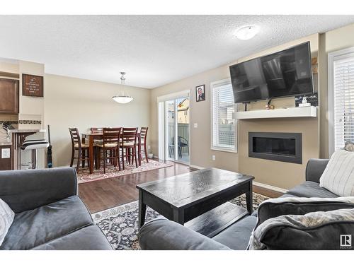 3104 16 Av Nw, Edmonton, AB - Indoor Photo Showing Living Room With Fireplace