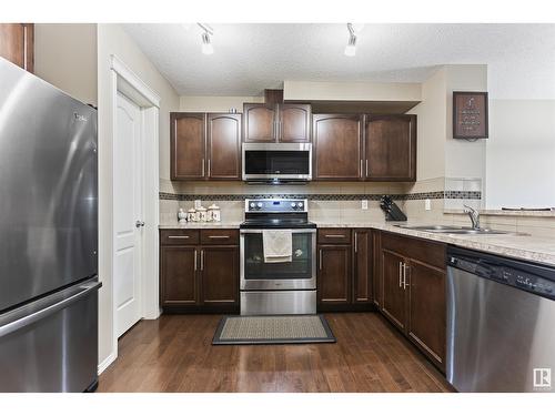 3104 16 Av Nw, Edmonton, AB - Indoor Photo Showing Kitchen With Double Sink