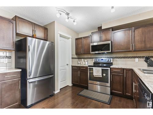 3104 16 Av Nw, Edmonton, AB - Indoor Photo Showing Kitchen With Double Sink