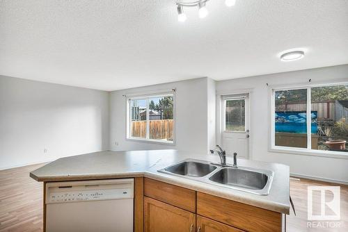 103 Rue Masson, Beaumont, AB - Indoor Photo Showing Kitchen With Double Sink