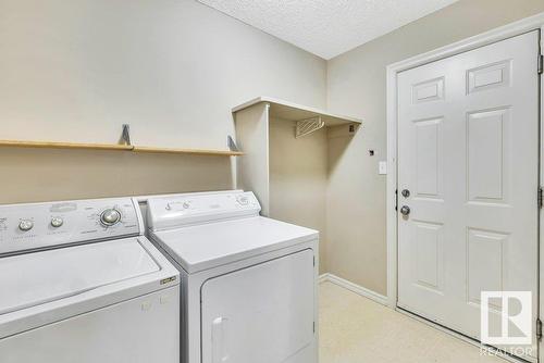 103 Rue Masson, Beaumont, AB - Indoor Photo Showing Laundry Room