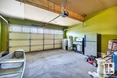 103 Rue Masson, Beaumont, AB - Indoor Photo Showing Garage