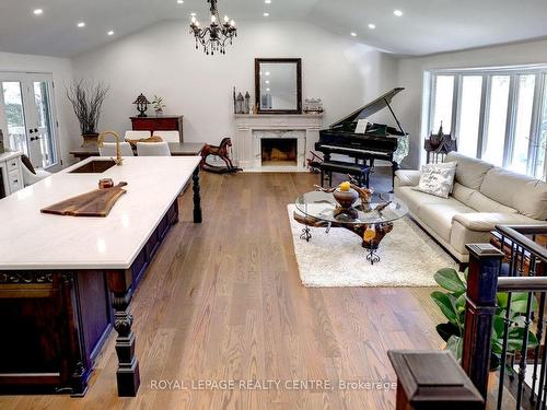 8 Bell Royal Crt, Toronto, ON - Indoor Photo Showing Living Room With Fireplace