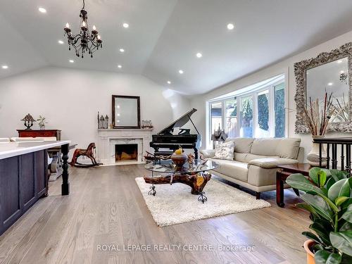 8 Bell Royal Crt, Toronto, ON - Indoor Photo Showing Living Room With Fireplace