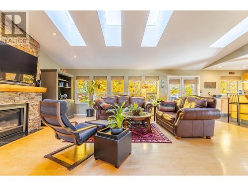 132 Christie Mountain Lane, Okanagan Falls, BC - Indoor Photo Showing Living Room With Fireplace