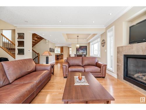 8728 101 Av Nw, Edmonton, AB - Indoor Photo Showing Living Room With Fireplace