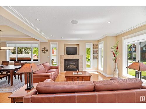 8728 101 Av Nw, Edmonton, AB - Indoor Photo Showing Living Room With Fireplace