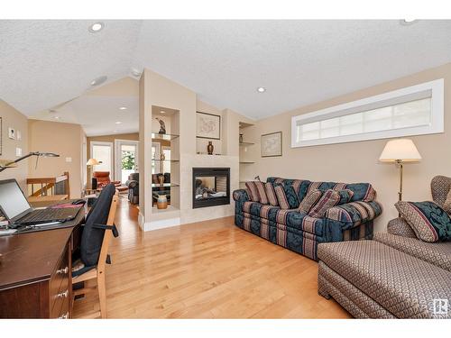 8728 101 Av Nw, Edmonton, AB - Indoor Photo Showing Living Room With Fireplace