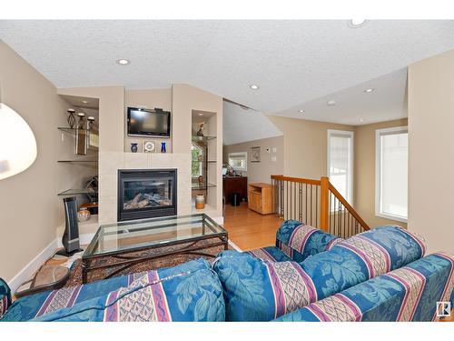 8728 101 Av Nw, Edmonton, AB - Indoor Photo Showing Living Room With Fireplace