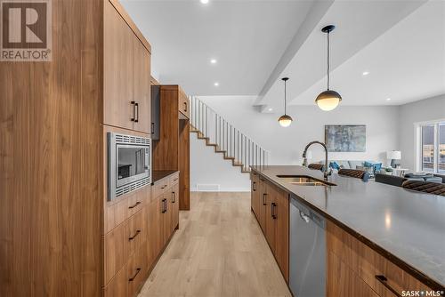 356 Leskiw Bend, Saskatoon, SK - Indoor Photo Showing Kitchen With Double Sink