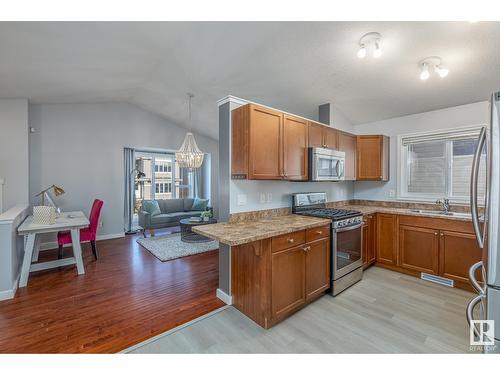 1543 35 Av Nw, Edmonton, AB - Indoor Photo Showing Kitchen With Double Sink