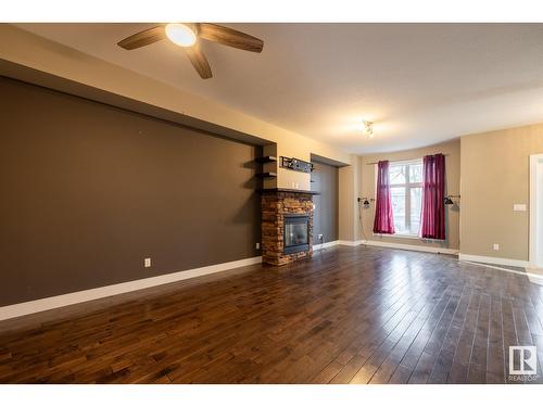 12221 102 St Nw, Edmonton, AB - Indoor Photo Showing Other Room With Fireplace