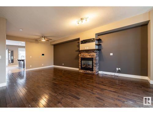 12221 102 St Nw, Edmonton, AB - Indoor Photo Showing Living Room With Fireplace