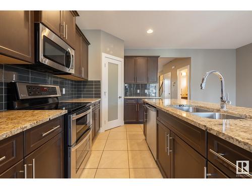 12221 102 St Nw, Edmonton, AB - Indoor Photo Showing Kitchen With Stainless Steel Kitchen With Double Sink With Upgraded Kitchen