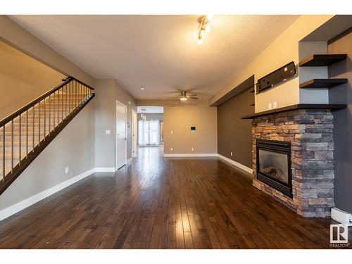 12221 102 St Nw, Edmonton, AB - Indoor Photo Showing Other Room With Fireplace