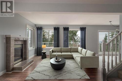 Virtually Staged - 4955 Laguna Way, Nanaimo, BC - Indoor Photo Showing Living Room With Fireplace