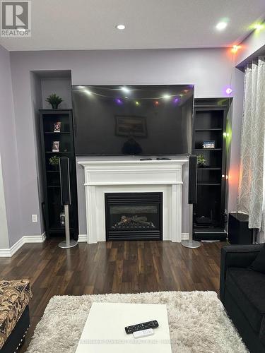 9 Magdalene Crescent, Brampton, ON - Indoor Photo Showing Living Room With Fireplace