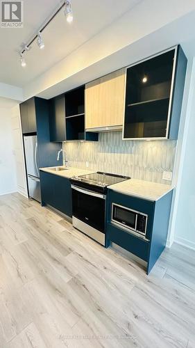 305 - 395 Dundas Street W, Oakville, ON - Indoor Photo Showing Kitchen