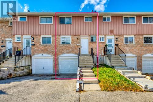 69 - 120 Quigley Road, Hamilton, ON - Outdoor With Facade