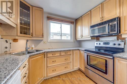 69 - 120 Quigley Road, Hamilton, ON - Indoor Photo Showing Kitchen With Stainless Steel Kitchen With Double Sink