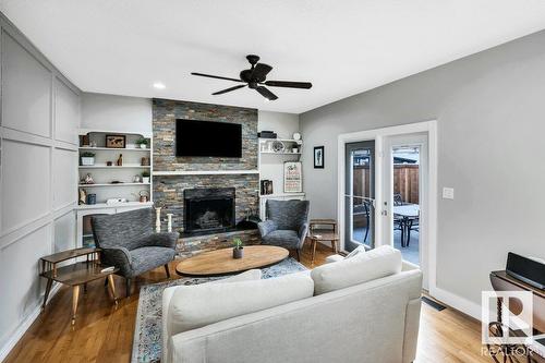 16 Westridge Cr Nw, Edmonton, AB - Indoor Photo Showing Living Room With Fireplace