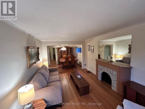 11 Arden Crescent, Toronto, ON - Indoor Photo Showing Living Room With Fireplace