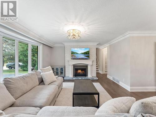 569 Indian Road, Mississauga, ON - Indoor Photo Showing Living Room With Fireplace