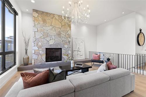 16 Ash Cove, Winnipeg, MB - Indoor Photo Showing Living Room With Fireplace